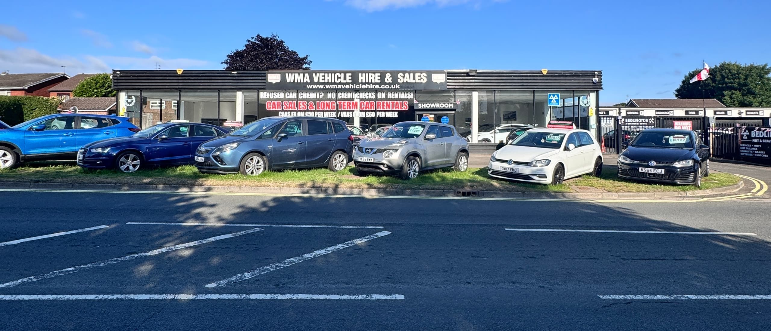 The WMA Motors showroom and forecourt on Glebe Road, Bedlington